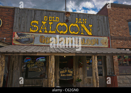 Front view of Gold Pan Saloon building with swing doors located  in historic Custer downtown South Dakota in Black Hills hi-res Stock Photo