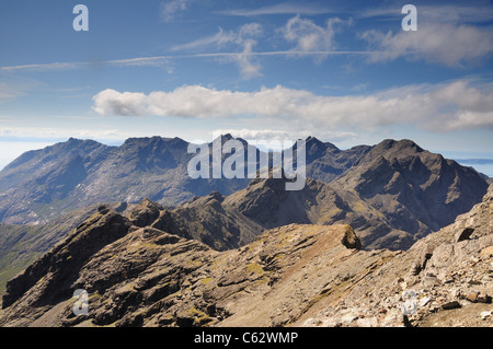 View over the dramatic jagged peaks of the Black Cuillin ridge from Bruach na Frithe, Isle of Skye, Scotland Stock Photo