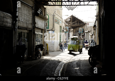 Three wheeler car working in bazaar in downtown Tehran. Stock Photo