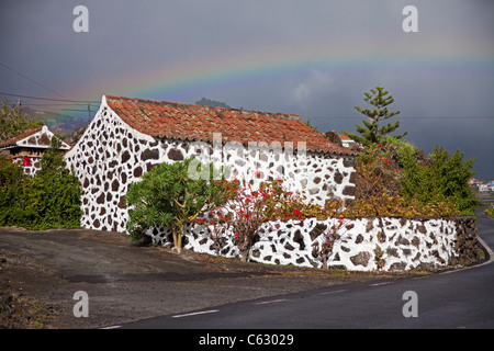 Rainbow over a typical small canarian house at Mazo, La Palma,  Canary islands, Spain, Europe Stock Photo