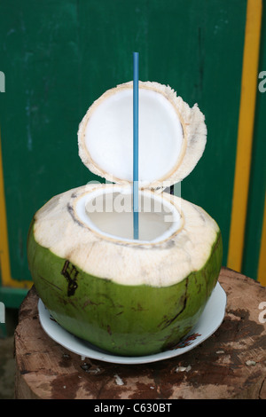 Coconut drink from warung at Teleng Ria beach in Pacitan Bay Stock Photo