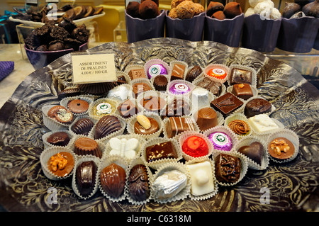 Brussels, Belgium. Praline assortment in a sweet shop window Stock Photo