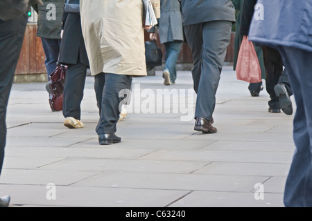 Commuters on London Bridge, London, UK Stock Photo