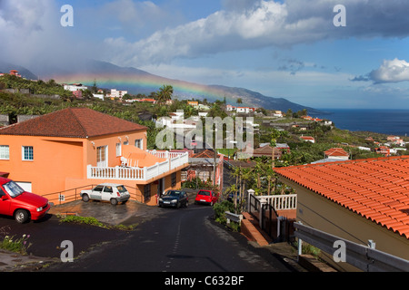 Rainbow over canarian houses at Mazo, La Palma, Canary islands, Spain, Europe Stock Photo