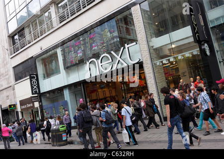 NEXT LONDON, high street fashion and accessory retailer, viewed here at an slightly angled aspect at their Oxford Street branch. Stock Photo