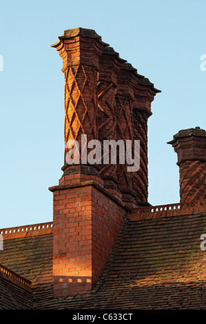 Elizabethan chimney stacks on the The Five Arrows hotel. Waddesdon, Aylesbury, Buckinghamshire, England Stock Photo
