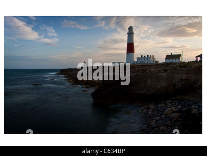 A photograph of Portland Lighthouse at Portland Bill in the UK, taken at sunset. Stock Photo