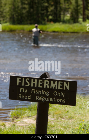 Fly Fishing only sign located on the Firehole in Yellowstone Stock Photo