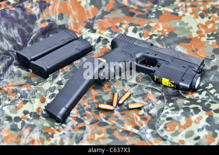 military handgun with tactical light/laser module Stock Photo