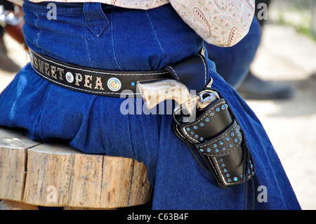 Woman wearing a Colt .45 at a fast draw competition Stock Photo