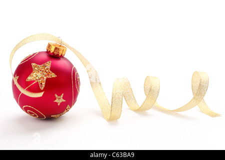 Red christmas ball with gold ribbon on white background. Stock Photo