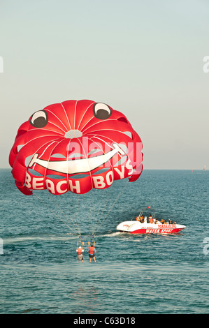 Turkey Sea parasail para sail flying beach boat beach boys Stock Photo