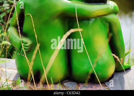 Green embracing couple Stock Photo