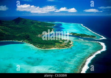 Aerial view of Huahine Island anchored in the blue South Pacific in the French Polynesia archipelago also called Society Islands Stock Photo