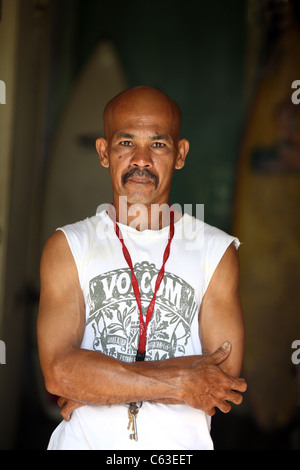 Portrait of man who lost his wife and daughter in the 2004 boxing day tsunami. His young son survived. Stock Photo