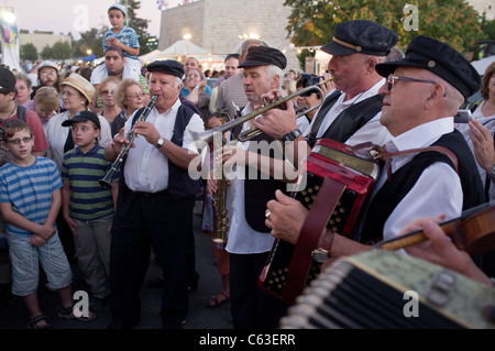 Klezmer musicians play Jewish soul music for the crowds in the 24th Int'l Klezmer Festival. Tzfat, Israel. 15/08/2011. Stock Photo