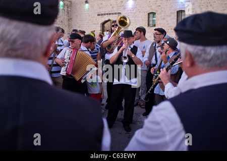 Klezmer musicians play Jewish soul music for the crowds in the 24th Int'l Klezmer Festival. Tzfat, Israel. 15/08/2011. Stock Photo