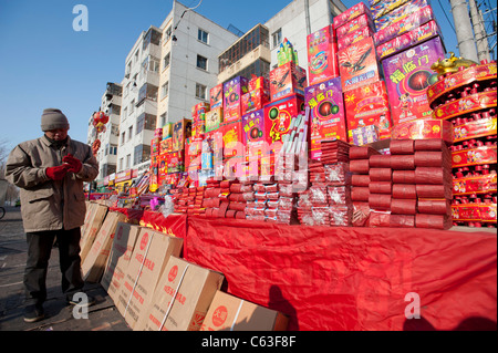 Many boxes of fireworks for Chinese New Year for sale on street in Harbin China Stock Photo