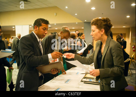 Job seekers attend a job fair in midtown in New York on Monday, August 15, 2011. ( © Frances M. Roberts) Stock Photo