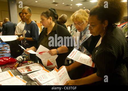 Job seekers attend a job fair in midtown in New York on Monday, August 15, 2011. ( © Frances M. Roberts) Stock Photo