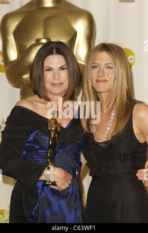 Colleen Atwood, Jennifer Aniston in the press room for OSCARS 78th Annual Academy Awards, The Kodak Theater, Los Angeles, CA, March 05, 2006. Photo by: Michael Germana/Everett Collection Stock Photo