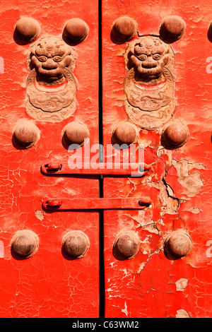 Red Door With Chinese Lions Stock Photo
