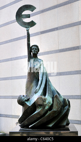 Brussels / Bruxelles, Belgium. European Parliament Building (1993) Bronze statue of woman holding Euro sign Stock Photo