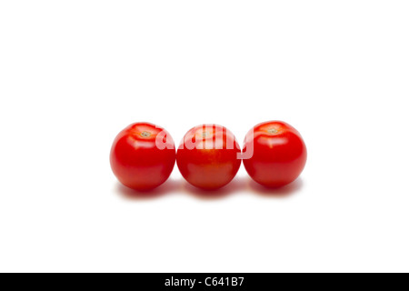 Three ripe cherry tomatoes Stock Photo