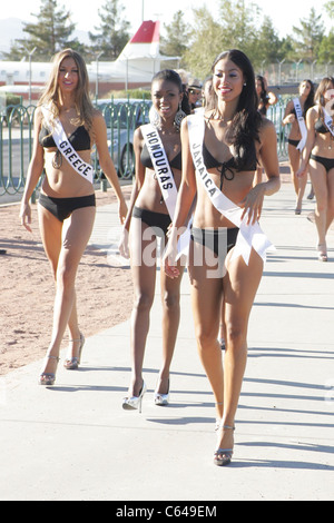 Anna Prelevic (Miss Greece), Kenia Martinez (Miss Honduras), Yendi Phillipps (Miss Jamaica) at a public appearance for Miss Universe Contestants Welcome to Las Vegas Sign Photo Shoot, Las Vegas Boulevard South, Las Vegas, NV August 11, 2010. Photo By: James Atoa/Everett Collection Stock Photo