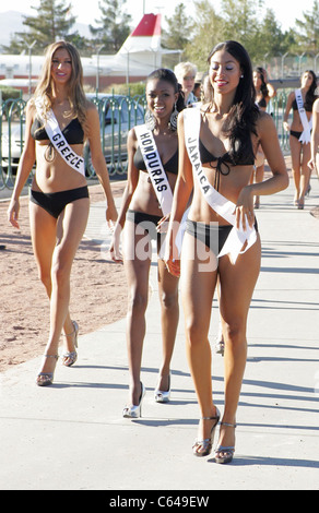 Anna Prelevic (Miss Greece), Kenia Martinez (Miss Honduras), Yendi Phillipps (Miss Jamaica) at a public appearance for Miss Universe Contestants Welcome to Las Vegas Sign Photo Shoot, Las Vegas Boulevard South, Las Vegas, NV August 11, 2010. Photo By: James Atoa/Everett Collection Stock Photo