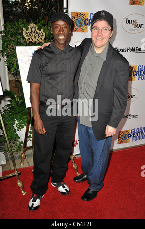 Don Cheadle, Jamie Gold in attendance for First Annual Global Creative Forum Evening of Entertainment, Four Seasons Hotel, Beverly Hills, CA October 11, 2010. Photo By: Robert Kenney/Everett Collection Stock Photo