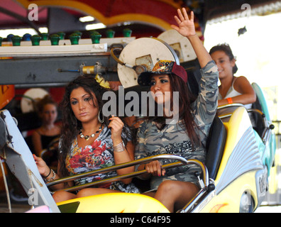 Deena Nicole Cortese, and Nicole Polizzi (Snooki) of the MTV Reality Show 'Jersey Shore 'on the 'Rock and Roll' ride at the boardwalk in Seaside Heights, NJ on Monday. out and about for JERSEY SHORE Season Two Celebrity Candids, , Seaside Heights, NJ August 9, 2010. Photo By: William D. Bird/Everett Collection Stock Photo