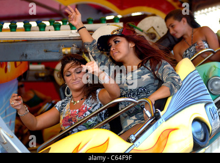 Deena Nicole Cortese, and Nicole Polizzi (Snooki) of the MTV Reality Show 'Jersey Shore 'on the 'Rock and Roll' ride at the boardwalk in Seaside Heights, NJ on Monday out and about for JERSEY SHORE Season Two Celebrity Candids, , Seaside Heights, NJ August 9, 2010. Photo By: William D. Bird/Everett Collection Stock Photo