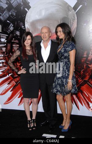 Rumer Willis, Bruce Willis, Emma Heming at arrivals for THE EXPENDABLES Premiere, Grauman's Chinese Theatre, Los Angeles, CA August 3, 2010. Photo By: Michael Germana/Everett Collection Stock Photo