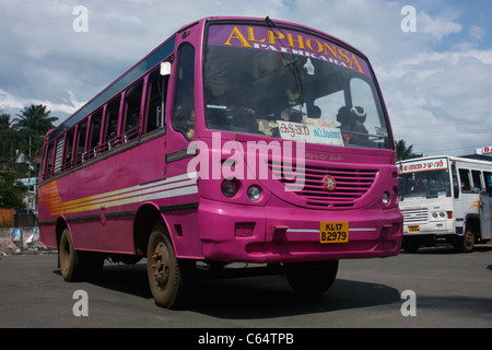 Private Express bus departing from bus station in Kumily Kerala India Stock Photo