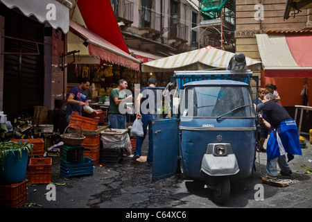 Traditional market and vespa scooter (old quarter, medieval and baroque architecture), Catania Sicily, Italy, Europe, EU.