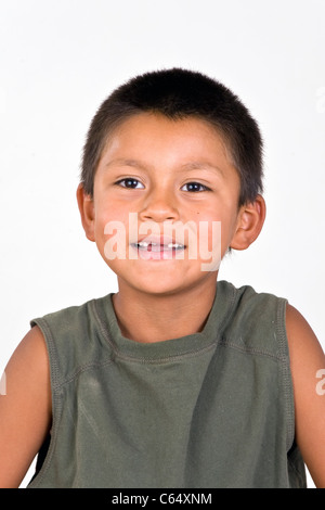 Young 6-7 year old Hispanic boy with two missing front teeth. MR © Myrleen Pearson Stock Photo