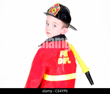 Young boy in fireman costume on white background Stock Photo