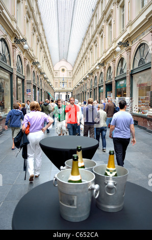 Brussels, Belgium. Galeries St Hubert (1864; J P Cluysenaer - neo-Classical) Champagne bottles in ice buckets Stock Photo