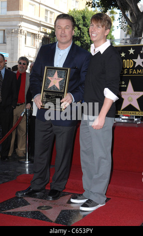 Alec Baldwin, Jack McBrayer at the induction ceremony for Star on the Hollywood Walk of Fame Ceremony for Alec Baldwin, Hollywood Boulevard, Los Angeles, CA February 14, 2011. Photo By: Elizabeth Goodenough/Everett Collection Stock Photo