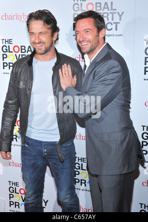 Gerard Butler, Hugh Jackman at arrivals for The Global Poverty Project will host the Global Launch of 1.4 Billion Reasons, MoMA Stock Photo