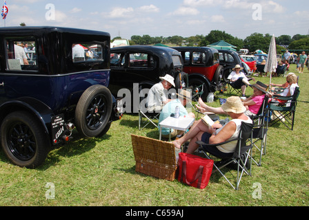 enthusiasts gathering together at classic car meeting  United Kingdom Stock Photo