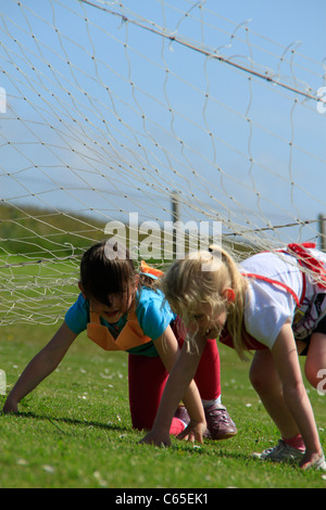 Obstacle course at school sports day Stock Photo