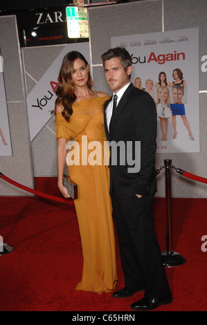 Dave Annable, Odette Yustman (wearing a J. Mendel gown)at arrivals for YOU AGAIN Premiere, El Capitan Theatre, Los Angeles, CA September 22, 2010. Photo By: Michael Germana/Everett Collection Stock Photo