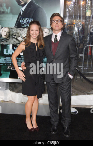 Robert Downey Jr, Susan Downey at arrivals for UNKNOWN Premiere, Village Theatre in Westwood, Los Angeles, CA February 16, 2011. Photo By: Elizabeth Goodenough/Everett Collection Stock Photo