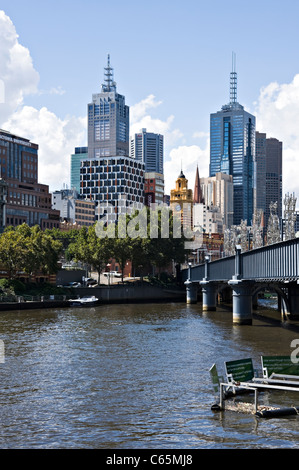 Sandridge Former Railway Bridge over Yarra River with Flinders Street Station and Skyscraper Towers Melbourne Victoria Australia Stock Photo