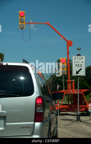 RED AND AMBER ROAD TRAFFIC LIGHT WITH BLUE SKY Stock Photo - Alamy