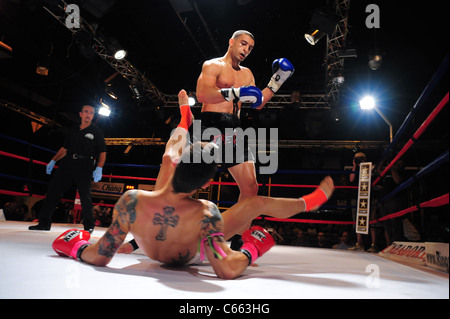 Omar Ahmed (black trunks), Marc Deluca (white trunks) at a public appearance for TAKE ON SHOW Presents $10,000 Professional Muay Thai Kickboxing Tournament, 7 Train Theater, Flushing, NY July 17, 2010. Photo By: Gregorio T. Binuya/Everett Collection Stock Photo