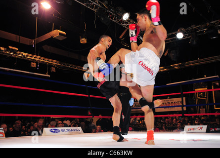 Omar Ahmed (black trunks), Marc Deluca (white trunks) at a public appearance for TAKE ON SHOW Presents $10,000 Professional Muay Thai Kickboxing Tournament, 7 Train Theater, Flushing, NY July 17, 2010. Photo By: Gregorio T. Binuya/Everett Collection Stock Photo