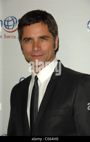 John Stamos at arrivals for Operation Smile's 9th Annual Smile Gala, Beverly Hilton Hotel, Beverly Hills, CA September 24, 2010. Photo By: Dee Cercone/Everett Collection Stock Photo